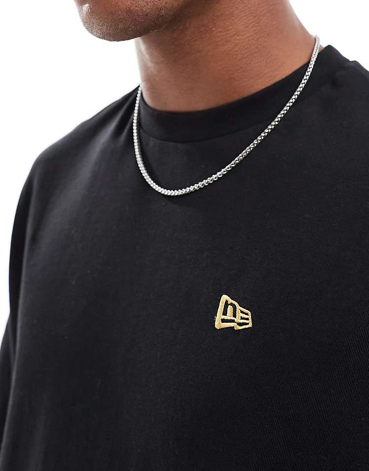 New Era Sticker Graphic Back T-shirt With Gold Foil In Black For Men - Image 3