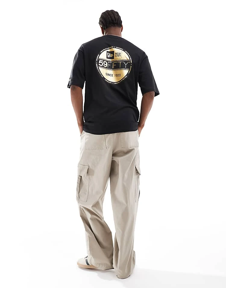 New Era Sticker Graphic Back T-shirt With Gold Foil In Black For Men - Image 4